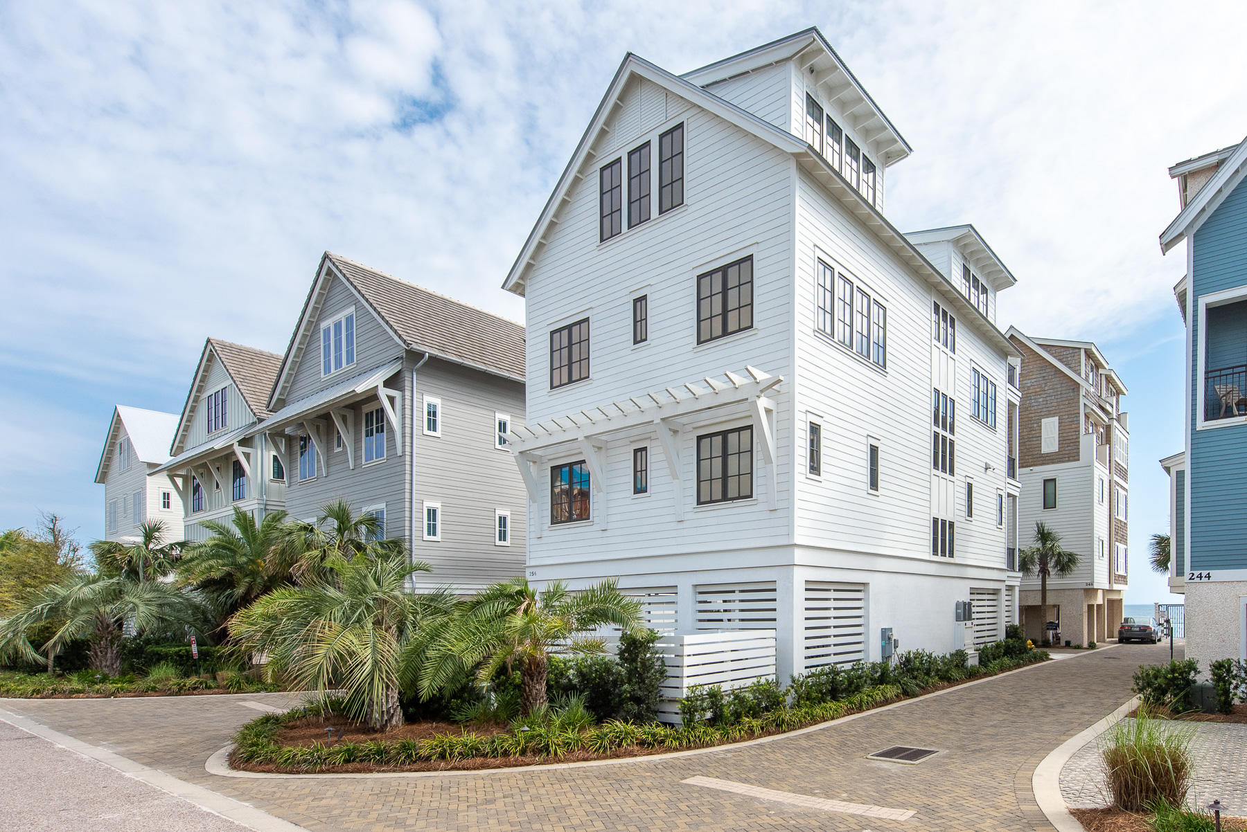 This stunning Inlet Beach home is one of the few exclusive homes located in The Bluffs. Desirably situated one home off the Gulf of Mexico and just east of Rosemary Beach. There is ample room for entertaining in this 6 bedroom 6.5 bath beach paradise. The 1st floor offers an outdoor loggia/patio featuring dining, shower, washer/dryer, and  bathroom. You are steps away from the beachfront community pool and 240' of private beach access. An elevator on the first level is a wonderful convenience to access 3 floors of this impressive home.The 2nd floor offers three beautifully appointed guest bedrooms. The first bedroom features a luxurious king bed and a private bathroom with a shower/tub combo. The 2nd bedroom offers a king bed and private bathroom with a shower and separate soaking tub.