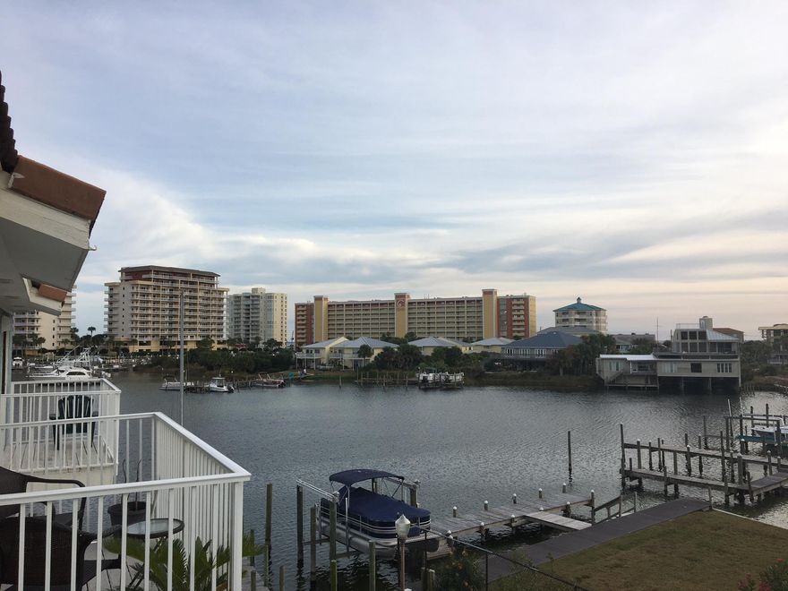 Live the Destin waterfront lifestyle for under $260,000! Located on Destin's harbor lagoon, you can launch your kayak or paddleboard right by your doorstep or bring your boat, with slips available for rent from the HOA for only $$ per month! If you prefer to just relax on your balcony and watch the dolphins play you can enjoy views from the 2nd & 3rd floor balconies. You can even avoid the traffic and take the water taxi to any of Destin's Harbor-front restaurants and nightlife right from your back door. Prefer to soak up the sun at the beach? This townhouse is just 3 short blocks to the white sandy beaches of the Gulf of Mexico. There is an oversized 1 car garage w/ plenty of extra storage + deeded parking space & additional guest parking. New HVAC Aug/16. Appliances are ''AS IS''.