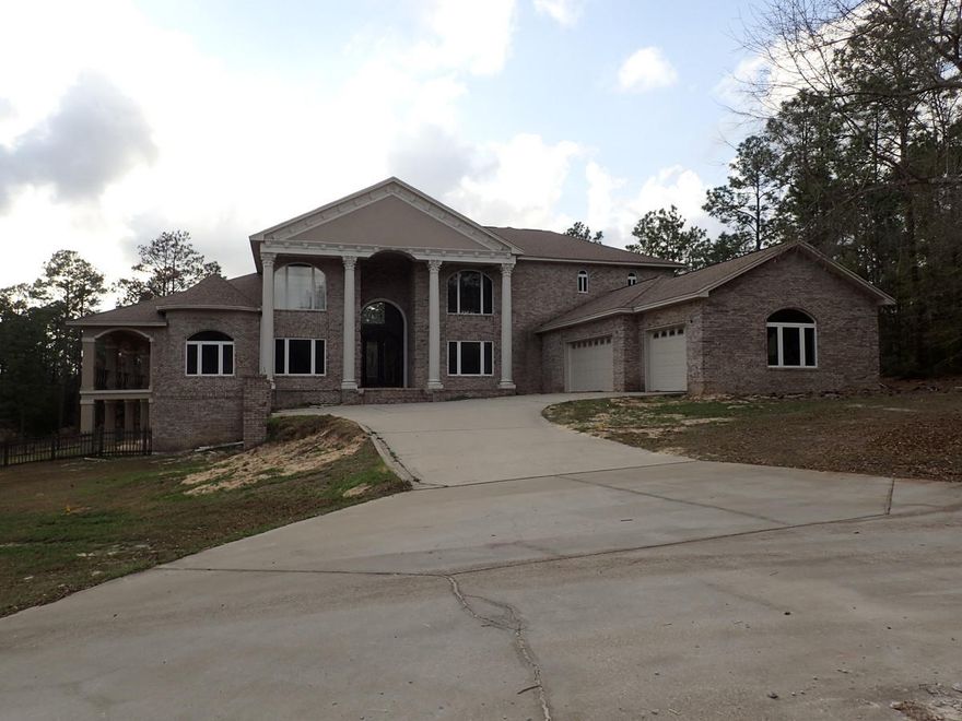 This is an REO Property. Talk about wow power and potential! This home is just waiting to go back to its original glory. If you looking for lots of room both to roam in and around your home - you found it. This 6500sf home has 3 floors (walk out basement considered a floor), 3 car garage, 5 bedrooms, 5 baths and so much more. Oversized master suite upstairs has fabulous views of the in ground pool and land, its own fireplace, and a master bath suite to die for. Kitchen area is open with tons of counter space and cabinets and has a dining/sitting area with fireplace. Sprawling stairwell in the foyer makes them home gush with character. See this home to appreciate its potential! Call today.