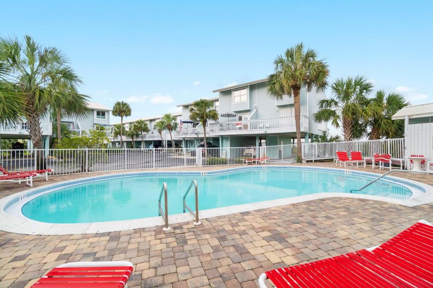 What remarkable views and location on Navarre Beach! It is tough to find such an amazing vacation home like this! 2 large bedrooms with 3 baths for your vacations or your private residence if you wish! New large boat slip / dock that extends out to the sound side views of Juanas restaurant. Just a short walk along the beach and there you are! Views of the Navarre bridge and also a quick walk or golf cart ride across the street to go hang out on the Gulf side with the larger beach waves! Public access is available all down the beach for parking. This community also features a pool around the corner from your unit! Private shaded parking under your unit with 2 levels of a fully furnished unit that is turn key!