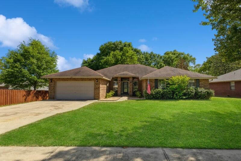 This beautifully well maintained home is ready for a new owner. This home is just under 3000 sq ft and has a whole lot to offer. The kitchen is spacious and a chefs dream come true with plenty of cabinets, an island and breakfast bar. The home has been recently updated with new vinyl planking floors throughout the main living areas. There is a flex room with multi purpose use. The living room has vaulted ceilings and a surround sound system. The master bathroom has a garden tub, separate shower and double vanities. Additionally, the covered patio is great for entertaining outdoors. You will love the space this home has to offer. Come take a look today !