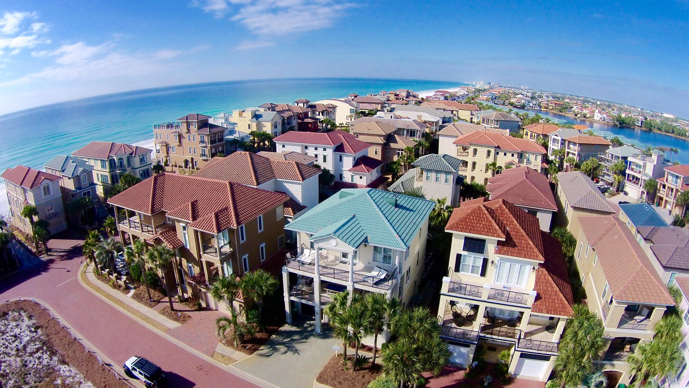 This stunning Mediterranean home has been completely remodeled and is ideally located in the prestigious gated community of Destiny by the Sea. Careful attention to detail was taken during the redesign process to maximize the functionality of this floor plan allowing abundant living space and pairing professional interior furnishings & decor with top of the line luxury finishes. This home boasts five bedrooms, including a Pinterest style bunk room and six full bathrooms & conveys fully furnished with over $100K in designer furnishings. The first floor features a formal living area open to the ample sized gourmet kitchen complete with custom cabinets, striking granite counter tops with tile backsplash, GE Profile stainless steel appliances, gas range, dual dishwashers and two bar height