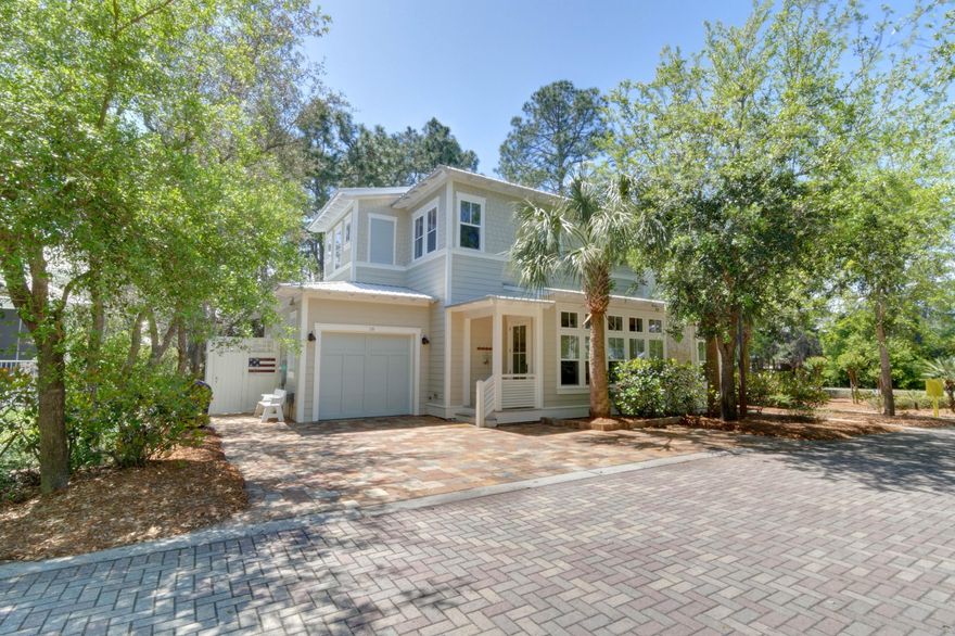 ***South of 30A*** .You Must See this Gem in the Quaint Community of Cottages at Eastern Lake.This beach house has the perfect location as it is a corner lot and is within walking distance to the Beach access. (There are Three Public Beach Accesses )This is a custom home just like New and the attention to detail is impeccable. It is sold furnished and it is the perfect home for family gatherings and creating memories. This home has a garage It features hardwood floors throughout, hurricane impact windows,tankless water heater, remote control for your A/C System, Granite countertops, stainless steel appliances, Gas Range and fireplace for all those cozy nights