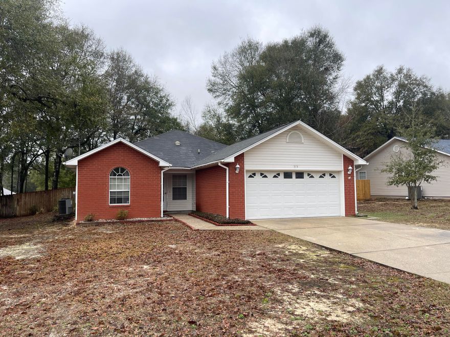 Cute 3 bedroom, 2 bath, brick home with an easy commute to bases, beaches, restaurants, shopping, schools, and more. This home is nestled on a large lot with a privacy-fenced backyard to include a covered back porch as well as an outdoor building. Inside, the spacious living room separates the two guest rooms (which share a full bath) from the rest of the house for added privacy. The eat-in kitchen has plenty of cabinet and counter space, a flat cooktop stove, breakfast bar, and pantry. The primary bedroom has its own en suite with a dual vanity and walk-in closet. Pets may be considered on a case-by-case basis with prior owner approval and a non-refundable pet fee. No smoking, including vapes.
