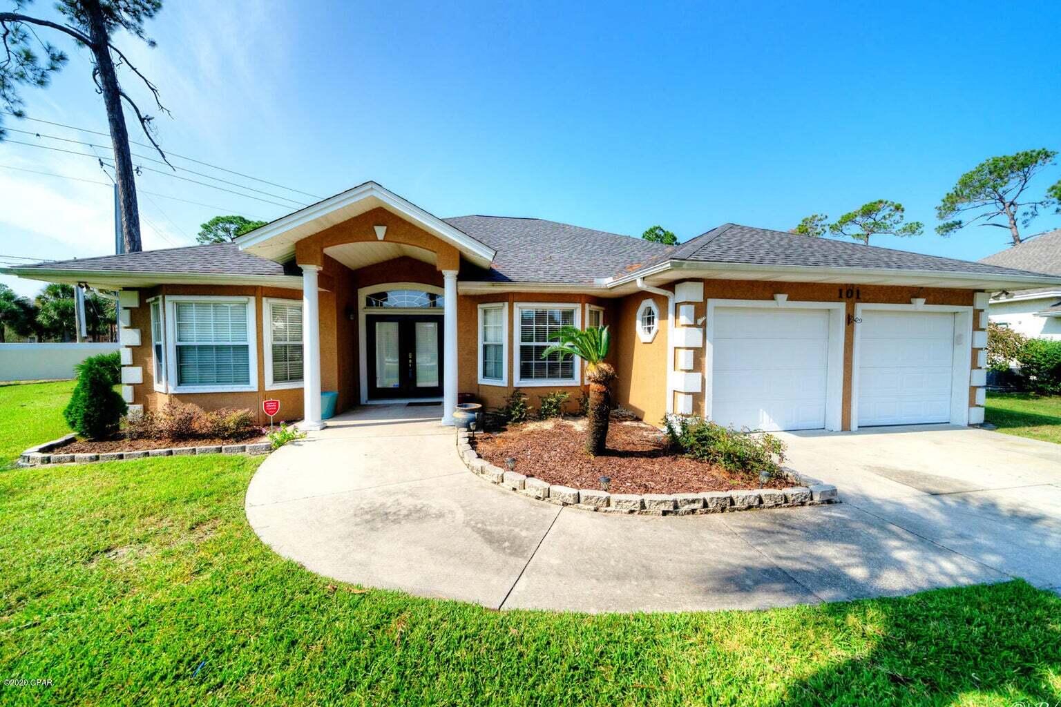 Palm Bay, one of the best communities on Panama City Beach! 101 Palm Harbour Blvd, updated, floors, split plan, family room kitchen and dining are all open together. Dining room can be used for play room, home school, office area, etc. The kitchen has stainless appliances with a breakfast bar. Spacious master bedroom and bath w/double vanity, separate tub and shower. The backyard is massive with a privacy fence and screened in porch for outdoor, Florida life! 2 car garage, private / low traffic cul-de-sac location, very quiet! Palm Bay is located not far from the Gulf, golfing, shops, grocery and plenty of restaurants. The neighborhood is also golf cart friendly. Come visit today!