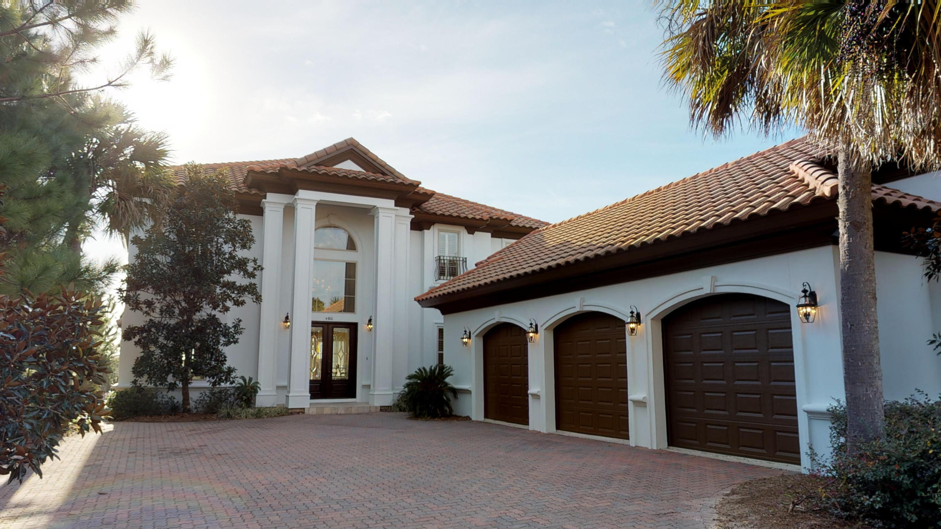 Endless Sunset - This elegant home is located on one of the premier lots in the gated community of Destiny East, overlooking beautiful Four Prong Lake. This truly exceptional home offers picturesque lake views and gorgeous sunsets from the pool and outdoor living area, as well as from the second-floor balcony. The sunsets are truly endless, and the views are truly breathtaking! Endless Sunset is a custom-built residence and has 4 bedrooms, 5.5 baths, a gourmet kitchen, a three+ car garage, 2 masters, and a second floor living room/media area. The incredible attention to detail is evident throughout the home beginning with the grand entrance, to the custom kitchen cabinetry, to the incredible outdoor space. Ideal for luxury rentals, family retreats, and special celebrations.
