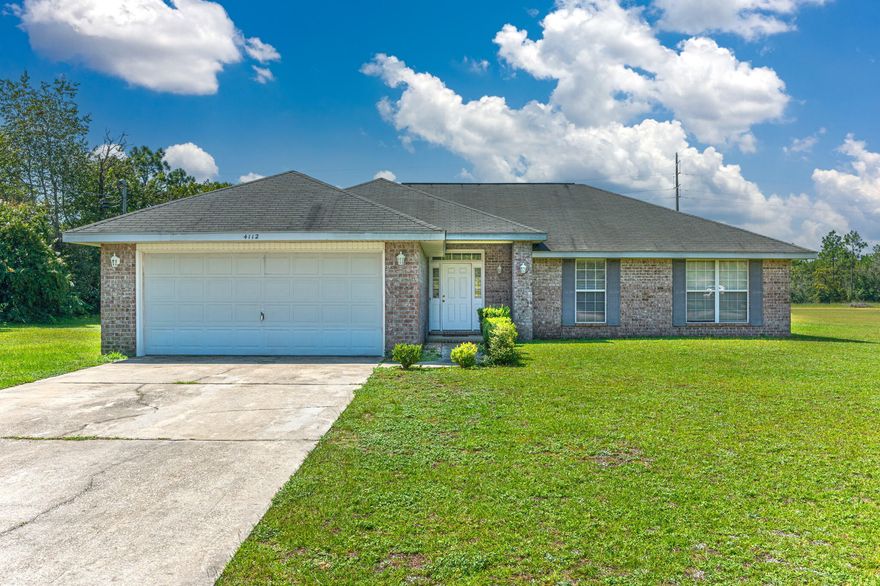 Fantastic buy in east Crestview on this almost 1800 SF home, positioned on one full LEVEL acre! Functional floor plan allows for 4 bedrooms and vaulted ceilings provide an open feel and space. HVAC condenser unit was replaced in 2020. This home has a split floor plan, so the master suite is separate from the additional bedrooms. Being sold AS-IS, schedule your showing today!