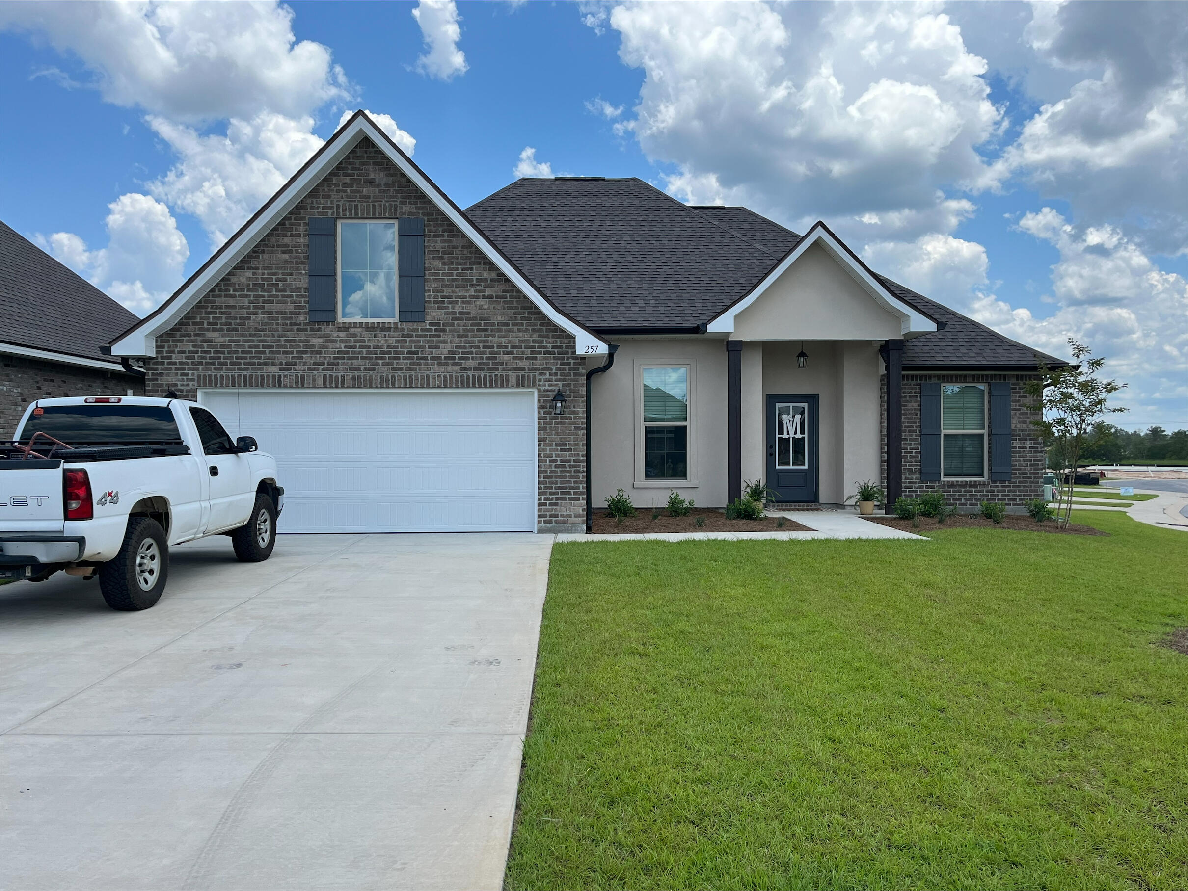 Awesome builder rate plus FREE front gutters. Restrictions apply.Located on a corner lot the ROSES V B in The Bluffs at Lafayette community offers a 3BR 2BA open design with flex space and computer desk/niche. Upgrades added (list attached).Special Features: double vanity, garden tub, separate shower, and 2 walk-in closets in master bath, tray ceiling in master bed, kitchen island, walk-in pantry, covered front and rear porch, recessed lights, crown molding, custom framed mirrors in baths, undermount sinks, landscaping, architectural 30-year shingles, flood lights, and more!Energy Efficient Features: tankless gas water heater, kitchen appliance package with gas, vinyl low E windows, and more! Energy Star Partner.