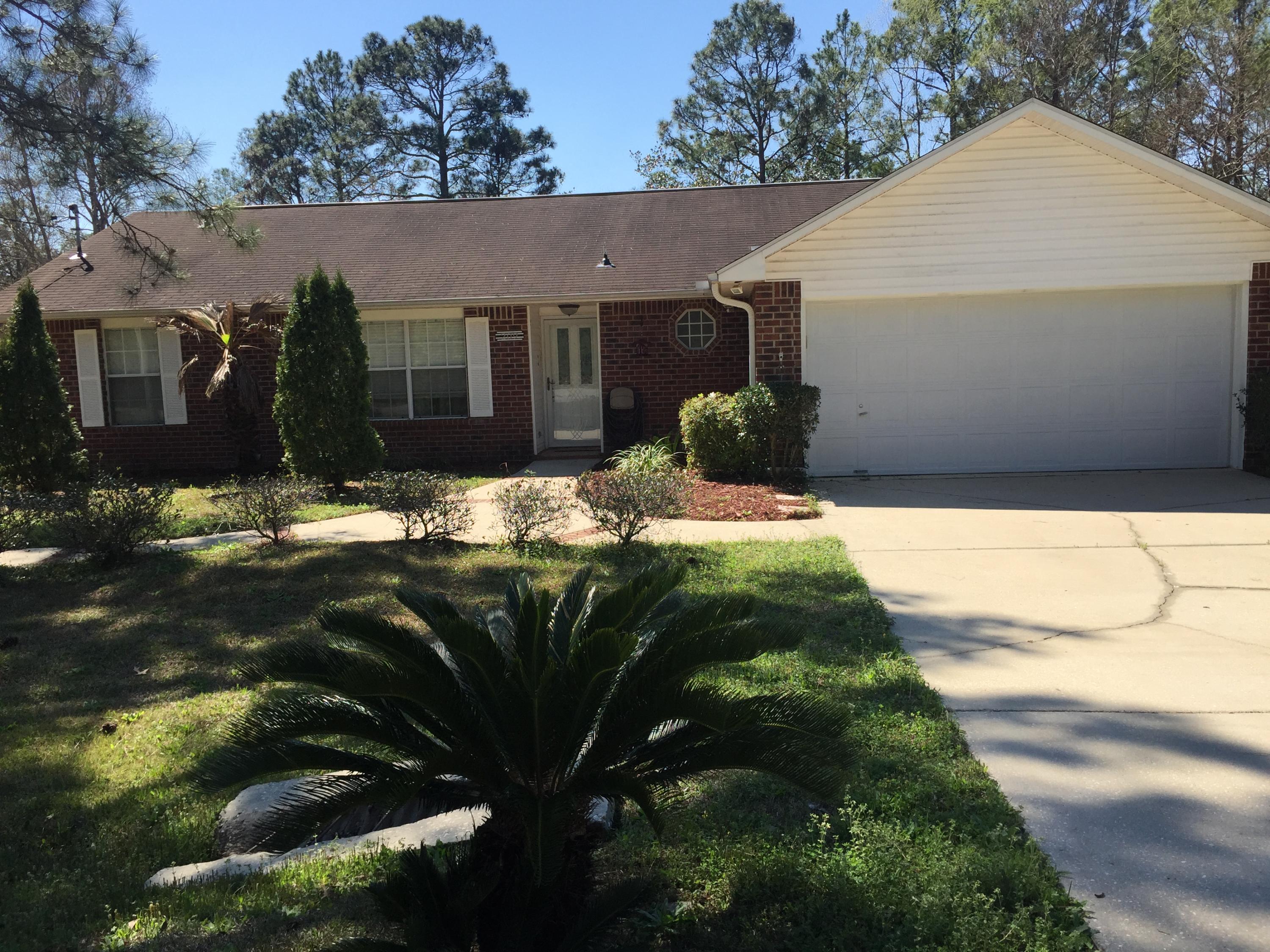 Beautifully kept home, centrally located in South Crestview! Easy access to Hwy 85 or I-10. This all brick home features a split bedroom plan for added privacy, a double garage with entry near the kitchen for easy unload of groceries and a shed for your lawn mower. The front has a meandering brick and concrete side walk that enhances curb appeal. Property to be sold as is condition.