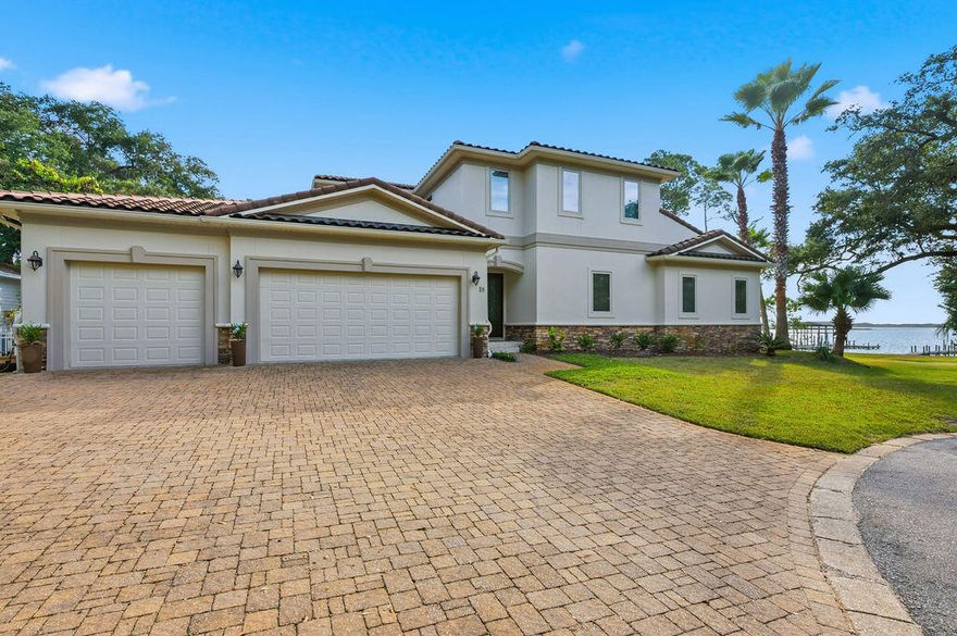 A rare opportunity to own a premier Sound-front residence in one of Mary Esther's most private and desirable locations.Perfectly positioned at the end of a quiet cul-de-sac just east of Mary Esther Blvd, this deep-water property offers exceptional luxury living with panoramic views of the Santa Rosa Sound and the Gulf. The main level showcases 10' ceilings, a guest suite with full bath, and expansive living, dining, and kitchen spaces designed to maximize natural light and water views. Upstairs, 9' ceilings, a spacious master retreat, and a convenient laundry room create an ideal layout for comfort and privacy. Every bedroom features its own private full bath and direct views of the Sound, with two oversized balcony doors leading to a serene outdoor sitting area--perfect for sunrise coffee or sunset relaxation.

Situated on over half an acre, the home sits elevated and set back from rising waters, offering both peace of mind and stunning vantage points. The large veranda overlooking the backyard is ideal for entertaining, complete with an outdoor gas fireplace for cozy evenings. The luxurious Master Suite includes a wet bar, gas fireplace, and breathtaking dual views of the Sound and Gulf, along with an expansive 11' ?? 12' walk-in closet. The kitchen boasts a massive center island designed for gathering, entertaining, and everyday enjoyment, while a large room just off the kitchen providing additional flexible living space to use as YOU desire.

Additional features include a heated and cooled workshop with a sink inside the garage... just the place for hobbies or projects. From the private dock, enjoy fishing, sunning, boating, or watching spectacular fireworks displays from Fort Walton Beach, Hurlburt Field, and Navarre.

This remarkable home is a true slice of paradise on the Emerald Coast and an exceptional chance to own unmatched Sound-front luxury in Mary Esther.
