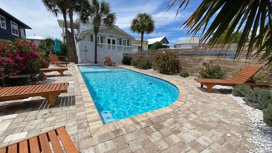 Sea LA Vie @ Grayton Beach is a Gorgeous Updated 4 bedroom, 4 bath home that sits steps away from the crystal clear waters. This Beach House is very popular and a very desirable rental because of it's location, layout, views and comfort.  This home is newly renovated & furnished with new full size heated swimming pool. This Vacation Haven also features 2 living rooms, 2 dining areas, plus 3 large porches...There is so much space for a large family or two!The home provides a one of a kind floor plan that allows for adults and kids to have their own private space.