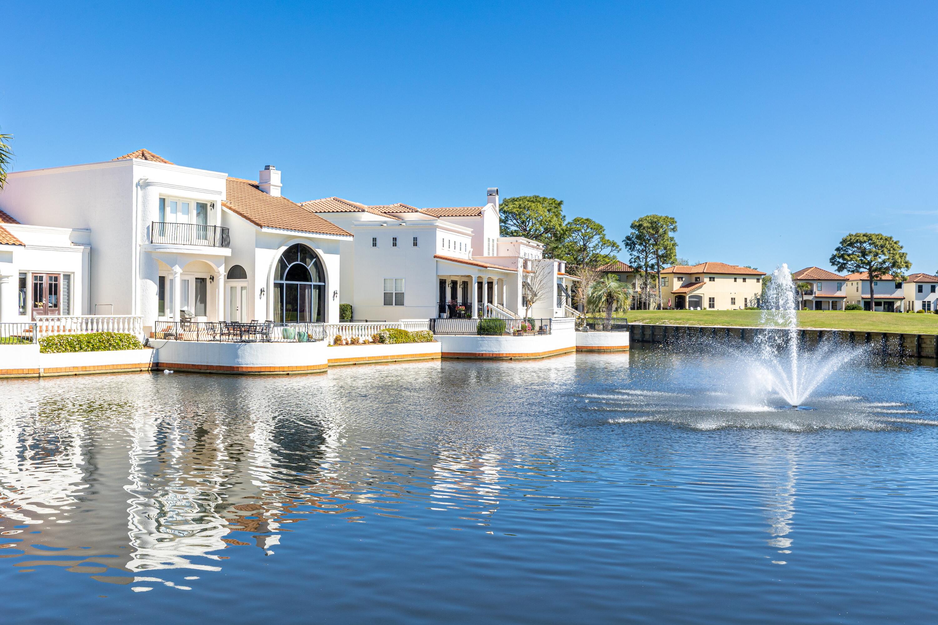 8064 Fountains Lane offers a thoughtfully renovated three-bedroom, three-and-a-half-bathroom home with an upscale coastal design. This home as been completely renovated to include new bathrooms, new countertops and fixtures, new flooring throughout and Thermador and Kitchenaid appliances.Floor to ceiling windows offer expansive views of the lake and golf course, bringing natural beauty into the living spaces. This home combines modern comfort with refined design in a serene setting.The Fountains is located directly across from The Village of Baytowne Wharf in Sandestin and is a low density, gated community offering security and convenience to shopping, dining, and annual events. Schedule your showing today.