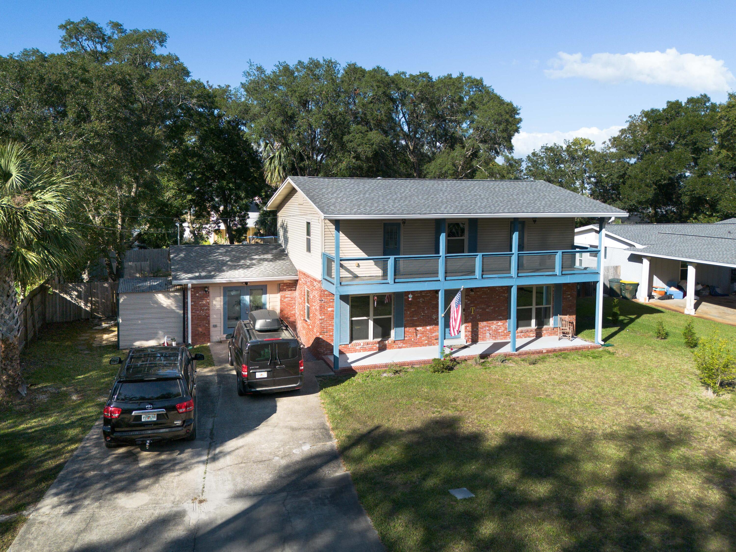 Come see this tastefully remodeled family POOL home. Front porch welcomes you into a beautiful blend of comfy elegance & coastal charm - roomy spaces with lots of sunshine. NEW laundry room, pantry, full bath and office. Custom treatments/features sure to bring a smile to your face: wood slat ceilings in foyer/dining; updated Florida cottage feel throughout; whole-house Culligan water softener AND inground saltwater swimming pool (low maint. costs, softer water gentle on eyes & skin, no chlorine!) Rare backyard big enough for swimming, entertaining AND brand new storage building/shop. This neighborhood haven is ideal for a healthy fun Florida lifestyle - walking, biking, nearby Ferry Park & FWB Yacht Club just around the corner (sailing lessons this summer!) Don't miss this one!