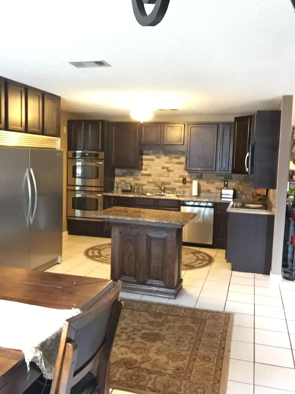 This is a great house with plenty of room for children and acreage for animals! The seller has upgraded the kitchen with a beautiful commercial stainless steal refrigerator, double oven, stove, moveable island and new cabinets. The master bath has been upgraded with double vanities. Gorgeous wood floors in both the master bedroom and bath. Large walking closet in the Master bedroom. The beautiful TV frame and TV above the fireplace conveys. The yard is complete with an in-ground pool and bar area, there is also a fenced in animal area. Nice shed/work shop with electricity and partial cement floor. The gazebo by the pool does NOT convey. This home is a great value and it will not disappoint!