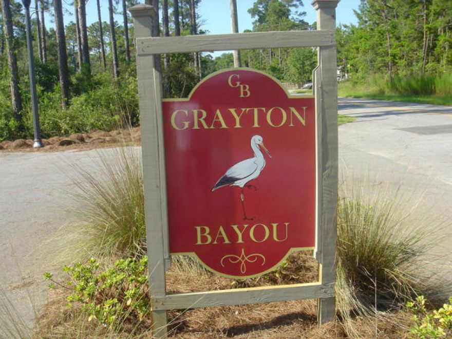 This beautiful lot is located just steps from the 2,000 square foot community pool and 300 yards from the communities boat ramp giving you access to Choctawhatchee Bay. In addition to the front entrance this lot has a rear entry ally way which would be great for a garage and/or carriage house. Grayton Bayou offers low Annual HOA fees, all underground utilities and islocated only 5 minutes from the beach.