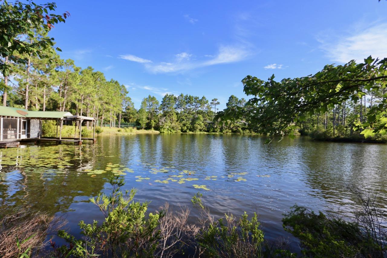 If fantastic views, proximity to our beautiful beaches, and access to world-class water skiing and wake boarding are of interest to you, then you have found gold with this property! Located on Shortline Lake, home to the world renowned Cory Pickos Waterski and Wakeboard School, you are treated to not only incredible lake views year round, but also easy access to try your hand at the fun, or just watch the incredible world class talent that trains here! As a previous host to many tournaments, including the likes of PanAmerican, the Southern Regionals, the US Nationals, and the US Open, it boasts that more world records, champions, and world medals have been seen here than at all other schools combined! To top it off, the world's most beautiful beaches are just a few minutes away! See More