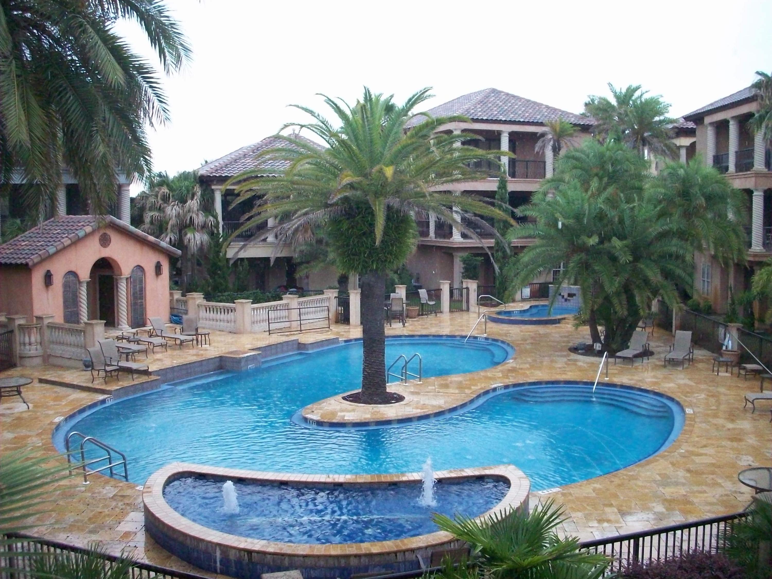 St Tropez's luxury is unequaled. Across the street from the Gulf, with deeded beach access, Lagoon pool, cobblestone street, over 500 palms & stunning architecture makes this a premier development not to be repeated. All high end appliances unique granite counter tops, pure luxury. Location is within walking distance of grocery, Silver Sands Designer Outlet and plenty of restaurants. This is truly an oasis beckoning you to come. Vacation rentals are permitted and this home is already in a rental program that will pay for ownership.