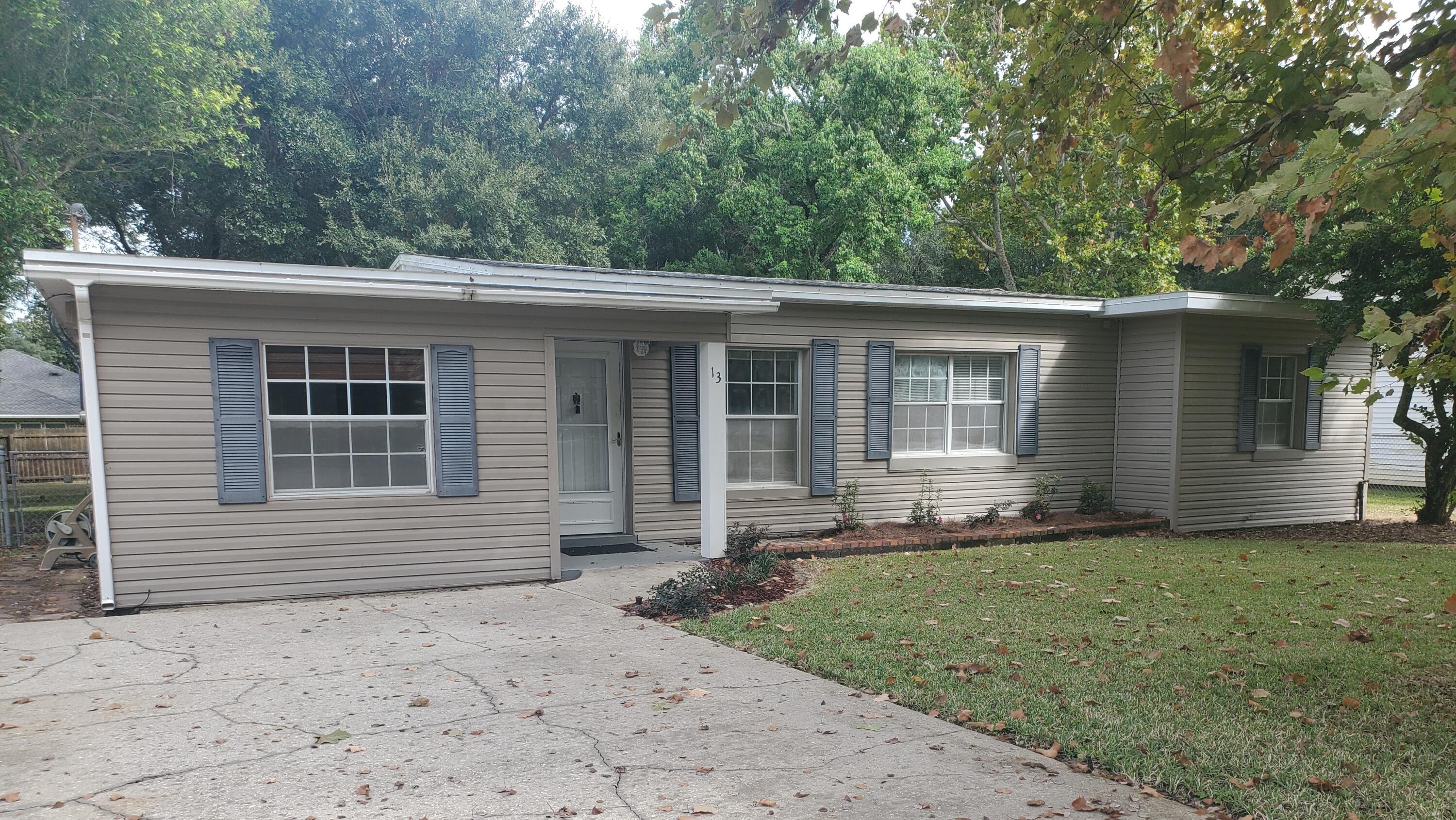 Prime location in Elliott Point! With three bedrooms and two baths, this charming and well-maintained Florida cottage offers many updates. Remodeled kitchen has granite counters and island, stainless appliances, pantry, double French doors and porcelain floors. Dining area with polished wood floors overlooks the large, fenced-in backyard with two sheds that convey. Use the enclosed carport as a man cave or a separate living area. Bedrooms have new carpet. Large guest bathroom with updated fixtures and separate shower. Updated electrical and plumbing. Roof 2013, water heater 2014, heat pump 2018.