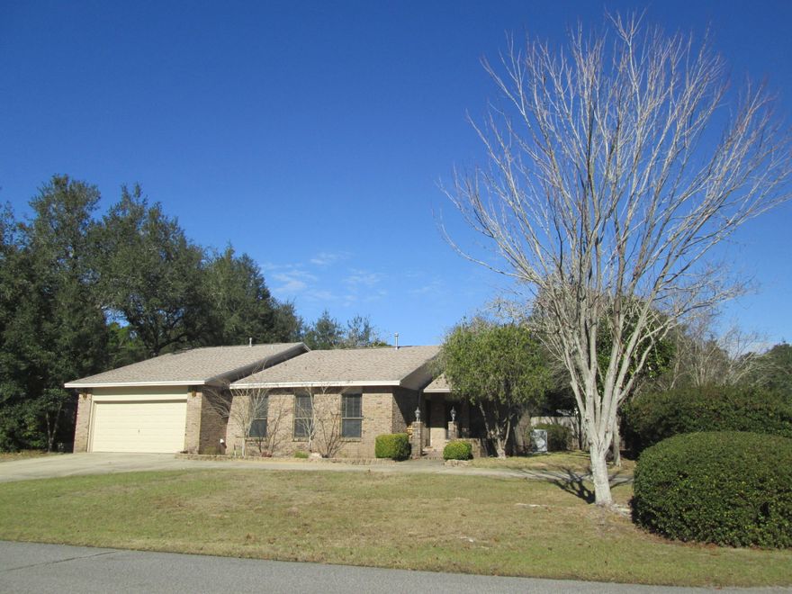 Well maintained brick home located on a corner lot in Bluewater Bay. Formal living and dining area, kitchen has lots of counter space and cabinets with two pantries, Breakfast bar in the kitchen, family room with fireplace is next to the kitchen, split bedroom plan,
each bedroom has it's own full bath, very large great room will allow large furniture, pool table, etc. All wood flooring except in the large great room, can exit onto the back patio from the family room or the great room, large fenced backyard, laundry room off the kitchen and next to the garage, private corner lot, two car garage with shelving. Lawn service provided.