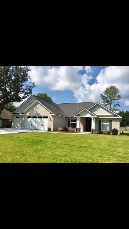 Curb Appeal!! Beautiful custom all brick , 4 bdrm, 2.5 bath house on a large flat lot. This 2100 sq ft home is conveniently located south of 1-10 offering quick access to interstate,restaurants/shopping, duke field and eglin. Kitchen is open to dining and family room with Cathedral ceiling, Oversized modern grey Island, Satin white wall cabinets with crown, beautiful matching Granite tops sparkle in this kitchen along with the stainless steel appliances, Large walk in pantryThe Master suite has crown and coffered ceilings Master Bath has his and her double vanity quartz top, oversized tiled shower with dual shower heads and Bench, Corner soaking tub, Plantation shutters Huge walk in closet. Tons of upgrades thru out this home!!