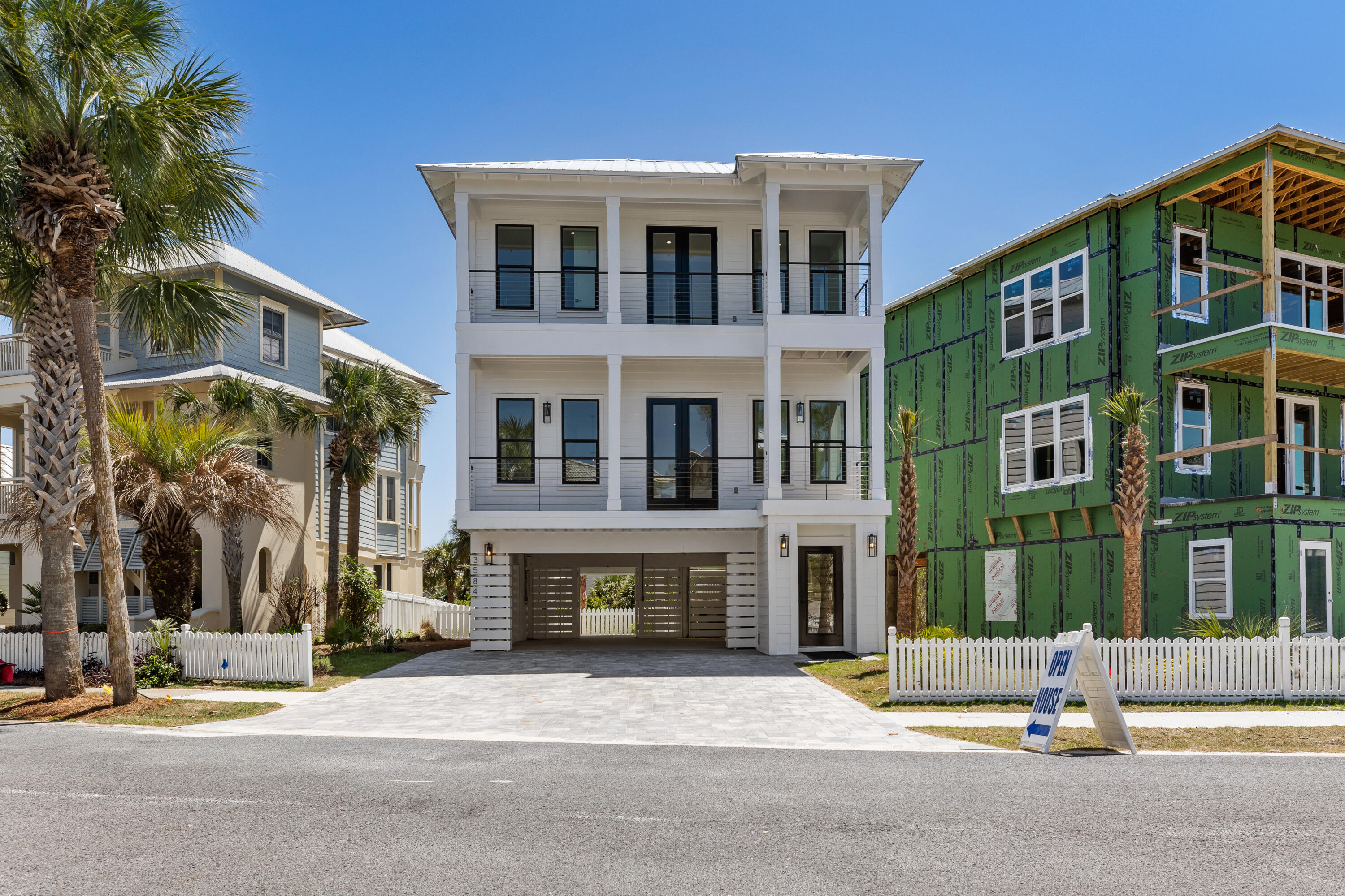UNDER CONTRACT and will review back-up offers. Construction Completed May 2023. Selling FULLY FURNISHED! Turn-Key for Short-Term-Rental! This brand new, custom-built home has been thoughtfully designed to maximize rental potential without compromising livability as your permanent residence or private vacation retreat.This coastal modern home features an open floorplan and gourmet kitchen, complete with Viking appliances. Ten-foot ceilings and eight-foot doors throughout give this home an airy feel. Each bedroom has a full, ensuite bathroom and private covered deck.Enjoy the relaxing views of Destin Harbor, the Gulf of Mexico, the neighborhood's natural beauty and Lake Caroline from the many decks throughout this home.