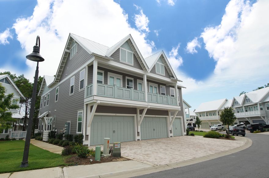 Coastal chic meets beach elegance at this charming 2B/2B townhome with one car garage in the popular community of Prominence on 30A. Spacious chef's kitchen overlooks living and dining area. The gourmet kitchen has quartz countertops and farm sinks and ElectroLux appliances and built-in microwave. Additional upgrades include hardwood floors throughout, soft close cabinetry and rain shower head in the master bath. Open living and dining areas have 10' ceilings and expansive windows. Two sets of French doors lead to covered deck overlooking neighborhood. Ideal two bedroom layout boasts king-sized master bedroom with ensuite, large walk-in closet, dual sinks, oversized shower and upgraded fixtures. Second guest bedroom is well-appointed with set of French doors leading to the balcony and tub/shower combo with convenient hall access. Laundry room includes full-size washer/dryer. With resort-style amenities, convenient location across from eateries and shopping at the popular Hub and a short bike, shuttle or car ride to the beach, this coastal charmer offers the best of everything that's great about 30A.