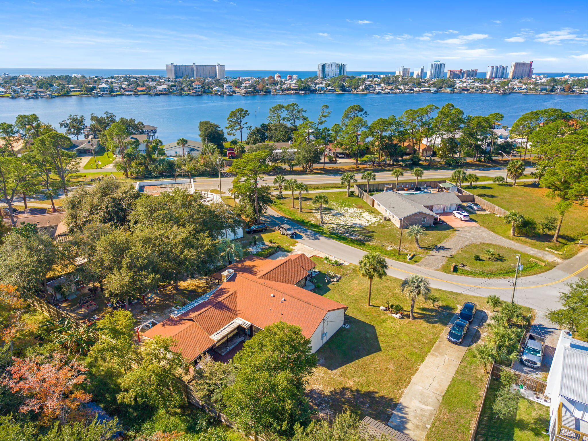 Endless Potential - Minutes From The Beach!  This charming 3 bedroom 2 bathroom is more than just a house; it's your gateway to the ultimate coastal lifestyle. The inviting open floorplan is perfect for hosting friends and family, or relaxing into the tranquility of beachside living.  Conveniently located by public boat ramps, beach access, and marinas, adventure is always within reach - whether it's fishing, water sports, or relaxing on the sand. Stepping into the expansive backyard, you'll notice space for a pool, a lush garden, or the ultimate barbecue haven. The powered workshop shed provides ample space for projects and storage for your gear. Situated on a sprawling 0.42-acre double lot, this property is zoned multifamily and allows short-term rentals, offering unmatched versatility. Whether you're dreaming of a spacious beach retreat, developing income-generating units, or seeking a smart investment in a prime location, the opportunities are endless.  This property is more than a home; it's an opportunity to live the life you've always imagined. Don't wait - schedule your private tour today!