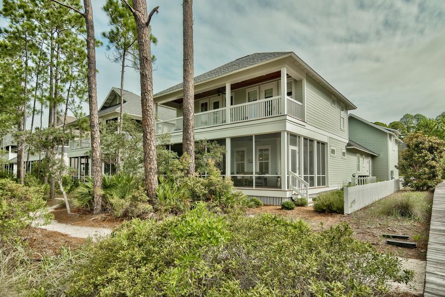 Welcome to your perfect 30a beach home! Located in the private gated community of Watersound West Beach, you will enjoy beach access to one of 30a's premier secluded beaches through Deer Lake State Park. This beautiful home features 2 HUGE porches overlooking the lake surrounded by bridges and boardwalks. The layout of this home is perfect for visits from family and friends--spacious master suite on the first floor and 2 bedrooms with updated baths plus a den with bunks on the second floor. There is also a carriage over the garage with bath, closet, kitchenette, and large storage area. The great room is open to the recently renovated kitchen and features a gas fireplace and french doors to the spacious screened porch with built-in gas grill and peaceful water views.