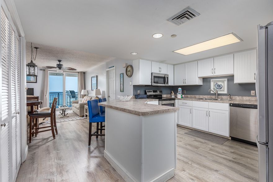 Situated on the 6th floor and overlooking the Gulf of Mexico, this renovated west end condo is sure to impress! The kitchen comes equipped with new stainless steel appliances, an under counter ice maker, and refaced kitchen cabinets. Upgrades include new sliding glass door, new water heater, updated bathroom counters, and luxury vinyl plank flooring throughout. Enjoy Gulf front views from the living room and master bedroom along with views of the intercoastal waterway from the second bedroom. Experience one of the largest balconies on the island perfect for entertaining friends and family with quality patio furniture. The Nautilus Condo has recently undergone extensive updates including fresh exterior paint and new balcony railings.