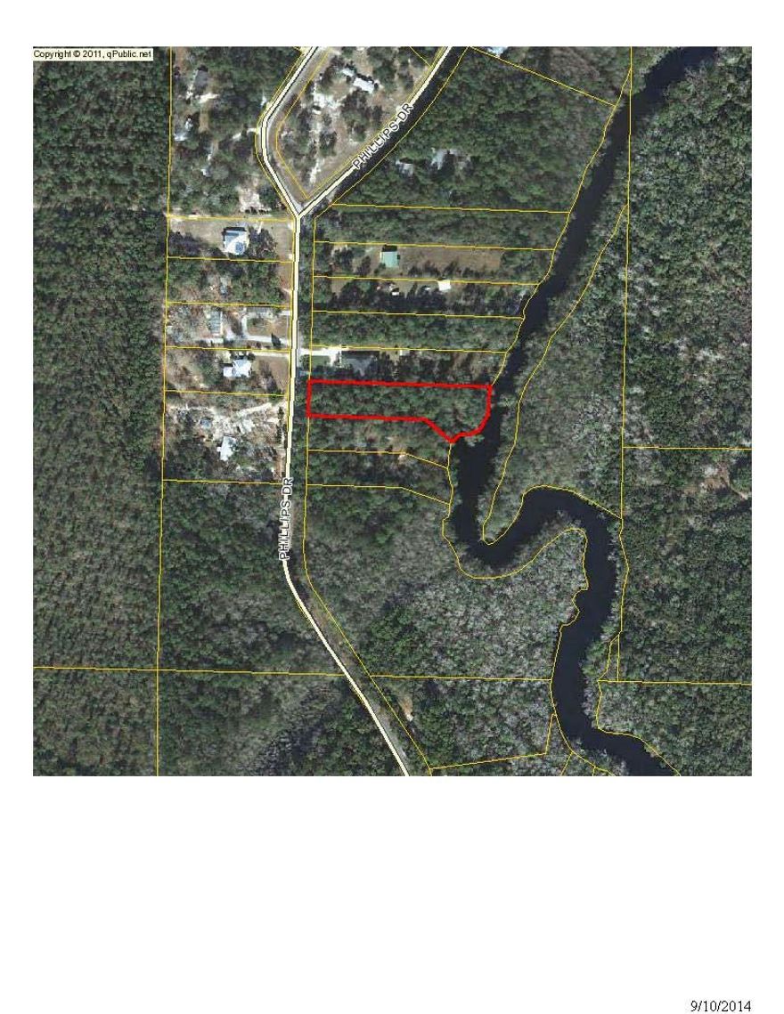 Beautiful wooded lot with approximately 225 feet of waterfront on Black Creek which runs into Mitchell River and then to the Bay. The lot is .96 +/- acres and would be perfect for your new home or just for a fishing getaway.