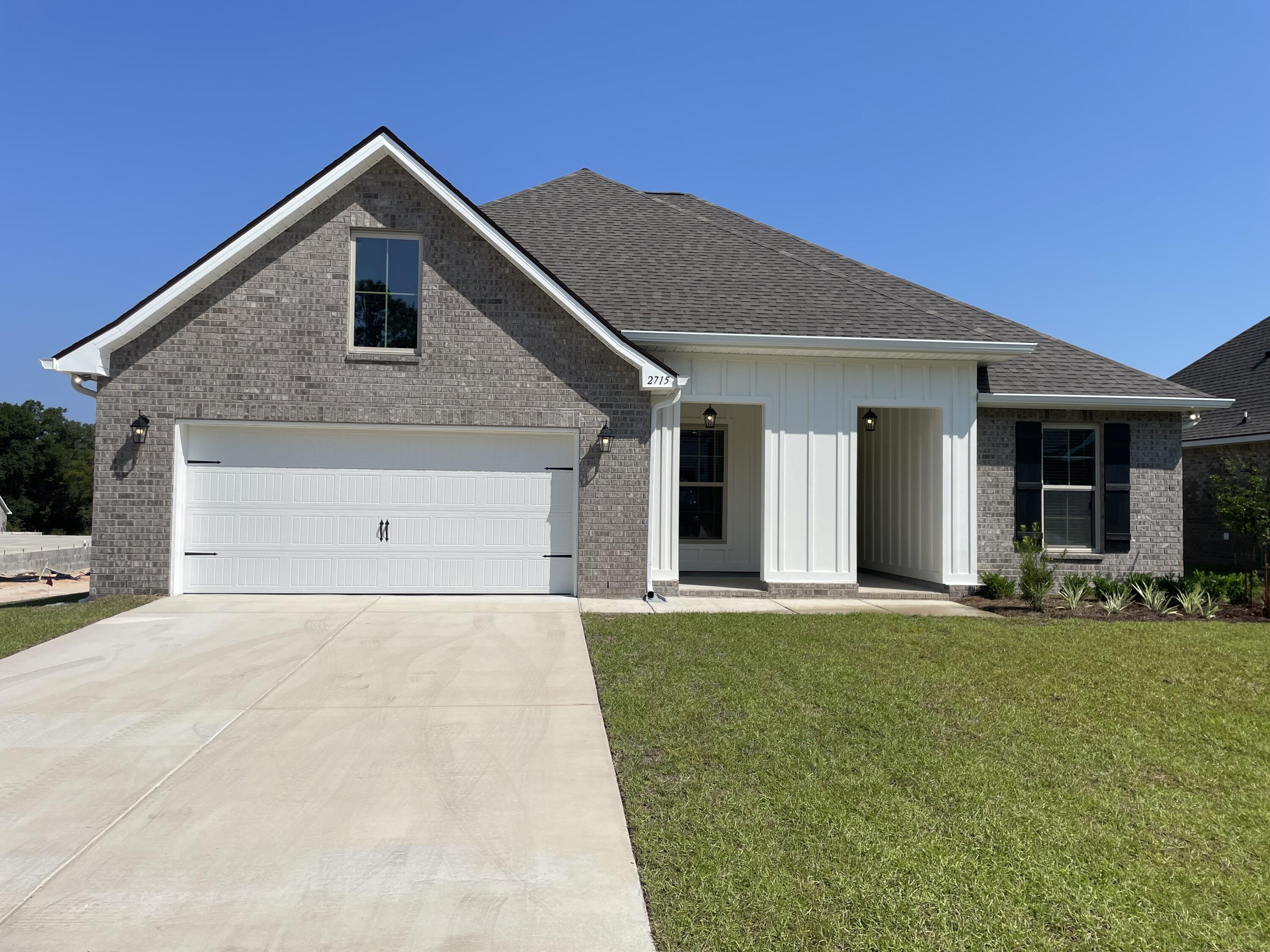 Awesome builder rate plus FREE front gutters. Restrictions apply.The HICKORY III G in Young Oaks community offers a 5 bedroom, 3 full bathroom, open design with formal dining room and separate den. Upgrades added (list attached).Features: double vanity, garden tub, separate shower, and walk-in closet in master bath, kitchen island, walk-in pantry, boot bench at garage entry, covered porches, crown molding, recessed lighting, ceiling fans, framed mirrors, smoke/carbon monoxide detectors, landscaping, architectural 30-year shingles, flood lights, and more! Energy Efficient Features: water heater, kitchen appliance package with a electric range, vinyl low E MI windows, and more! Energy Star Partner.