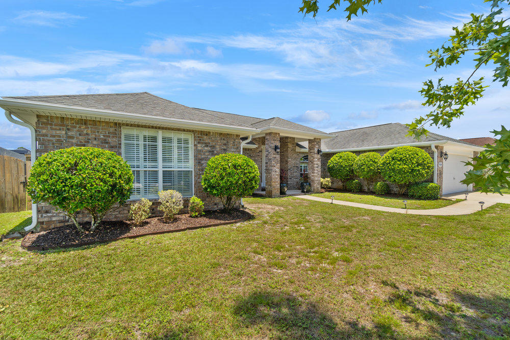 Welcome inside to this elegant home in The Meadows!This home provides an open concept for plenty of entertaining with friends and family. The floors have been updated, and the living room features marble. The home is in such terrific shape, you can tell from the moment you walk inside, it feels like home. The property is in East Navarre which provides a quicker commute if you are traveling to Hurlburt Field AFB or Destin.The HVAC unit and the water heater have already been replaced and updated within the past 3 years. The home also has ongoing service provided by pest control to keep the exterior in great shape. Please come by and view all the details that will make you call this one, HOME!