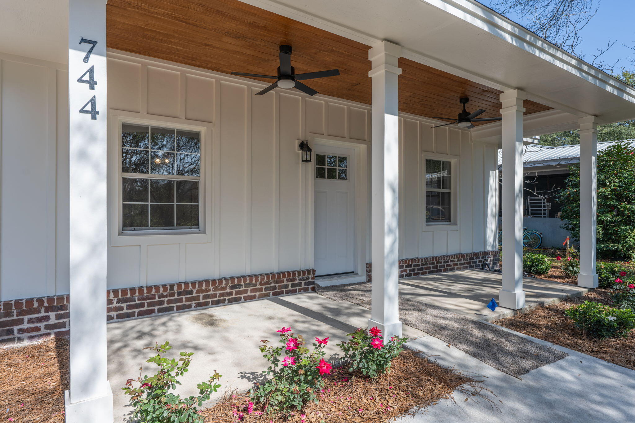 Step into this stunning 4-bedroom, 2.5-bathroom home, beautifully updated with high-end finishes and thoughtful upgrades throughout. Featuring two spacious living areas, one with a cozy gas fireplace (propane) accented by shiplap, this home is perfect for entertaining. The newly remodeled kitchen boasts quartz countertops, stainless steel appliances, a gas stove, and upgraded hardware. Fresh LVP flooring flows through the main living areas, while all bedrooms feature new plush carpet. The luxurious primary suite includes a new tile walk-in shower with seamless glass surround, double vanity with quartz countertops, and stylish new lighting. Additional highlights include a 2019 roof, brand-new HVAC and water heater (2025), copper wiring and copper plumbing pipes. Outside, enjoy fresh landscaping with a new irrigation system, a modernized front exterior with new brick and cement siding, and a charming tongue-and-groove ceiling with fans. Every detail has been meticulously upgraded, making this home truly move-in ready! This home sits on a  corner lot with a spacious yard for storing your boat, RV, and whatever other toys you may have. Do you have trailers for your business that need to be parked somewhere? This property would be perfect for you. 