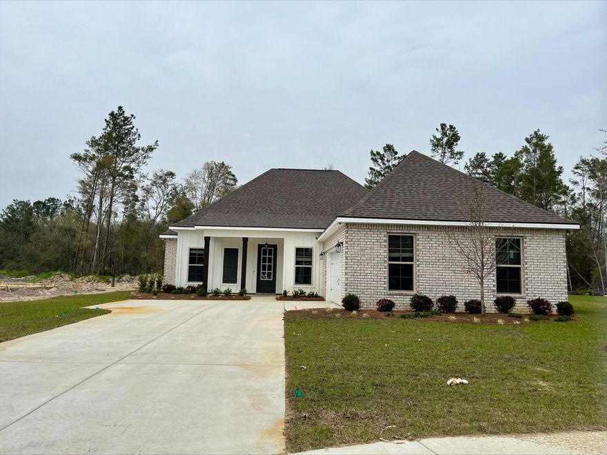 The HENRI III G in Starburst at Hammock Bay community offers a 4 bedroom, 3 full bathroom, open design. Upgrades added (list attached).  Features: separate vanities, garden tub, separate custom tiled shower, and walk-in closet in master suite, tray ceiling in master bedroom, sitting area in bedroom 3, kitchen island, walk-in pantry, boot bench and drop zone in mudroom, covered front porch and rear patio, crown molding, recessed lighting, smart connect Wi-Fi thermostat, smoke/carbon monoxide detectors, landscaping package, architectural 30-year shingles, flood lights, and more!Energy Efficient Features: water heater, kitchen appliance package, vinyl low E windows, and more!