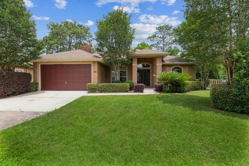 Beautiful Mediterranean inspired home which has 3 bedrooms, 2 bathrooms and a den. The split bedroom design is open and spacious and features high ceilings in the living areas, bullnose corners, and recess lighting. The kitchen has stainless steel appliances, a gas cooktop and opens to the breakfast nook. The living room includes a gas fireplace and is open to the dining room and kitchen area The master suite has tray ceilings, a large shower with dual shower heads, a jetted tub, and his and her closets. The outdoor living space has a paver patio and covered lanai with a plumbed gas line, perfect for grilling. The private backyard is fully fenced and don't forget to view the large side yard. New water heater (April 2021), HVAC (fall 2016). New roof to be installed June 2021!! This home is conveniently located just a short distance from the mid-bay bridge into Destin. You also have easy access to the by-pass to Duke or Eglin military bases and the Destin-Valparaiso Airport. This home is on a cul-de-sac.