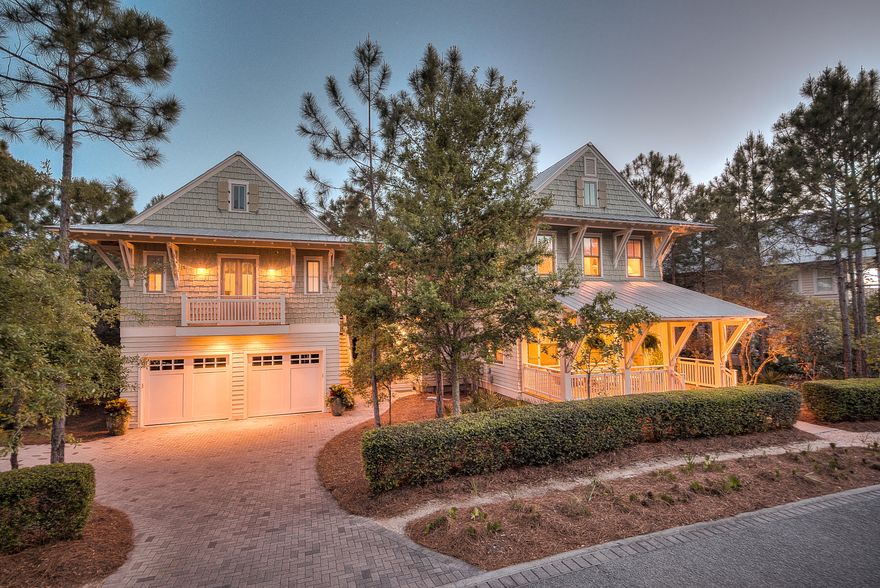 Serenity, privacy, and exquisite architectural design...this secluded Sandy Creek retreat is ideal for part-time or full-time family living! This home sits on one of the largest lots in Watercolor that includes an incredible outdoor living space with a gas vented fire pit and grill. The oversized lot will easily accommodate a large pool and cabana as well. This home offers exceptional design and upgrades throughout. The first floor has a spacious, open living area with professional kitchen that boasts an oversized granite island, Subzero refrigerator and wine cooler, a Wolf 6 burner gas range, pot filler, and new cabinets with an expanded pantry and generous size laundry room. A gas burning fireplace in the great room serves as the focal point with surround sound for entertainment.