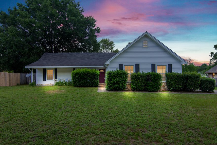 Stop the car and look no farther. This South Crestview country home is a must see. Your new home is conveniently located with easy access to our local bases, white sandy beaches, schools, shopping, doctors, and dining. The home it self features country charm inside and out with a large covered front porch, stone accents, and large level yard with a privacy fenced back yard that is perfect for the kids and pets to roam and play while you enjoy weekend bbqs with friends and family. Inside you will notice the high cathedral ceiling, a wood burning fireplace, wood look flooring, and wood trim/accents throughout. This house will make the perfect home for your first time home buyers to your  empty nesters and everyone in between. Call to schedule your appointment today!