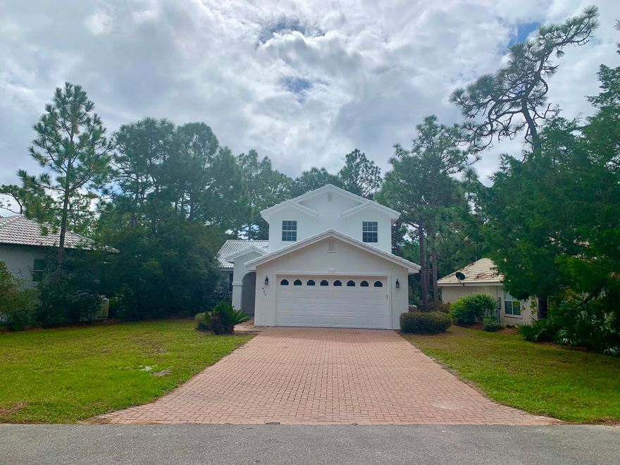 Ideally located in the heart of Seagrove, this spacious 3 bedroom, 2.5 bath lakefront home is located in the gated community of Somerset Bridge at Seagrove. This quiet community is just 1/2 mile from the beach and backs up to Point Washington State forest providing an abundance of peace and quiet. The home has just been refreshed inside and out with new paint, new granite countertops, and beautiful tile showers in the bathrooms, and is completely move in ready! This home boasts a very comfortable open floorplan with sight lines all the way from the kitchen to the lake in the back yard. The master bedroom has a large bathroom with double vanities & walk in closet, and is conveniently located just off the living room on the main floor. Both spare bedrooms are located on the second floor and share the second bath. There is an oversized laundry/pantry just off the spacious kitchen.