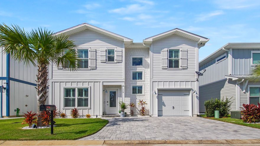 LIKE NEW and just minutes to the beach. This custom home was completed in 2021 and has been impeccably maintained. Ideally located on the 30A Scenic Corridor with easy access to shopping and restaurants. The builder spared no expense with impact windows and doors, 10' ceilings, custom cabinets, upgraded flooring, tankless gas water heater, water softener, epoxy garage floor and advanced media wiring. Located in a quiet community ideally suited for primary or second home owners. The open concept floor plan is perfect for entertaining. Upstairs, you'll find an oversized primary suite, two guest rooms with full bathroom and large laundry room. The fully fenced back yard is a true oasis overlooking the State Forest. Enjoy the private pool, grill patio and deck with retractable awning.