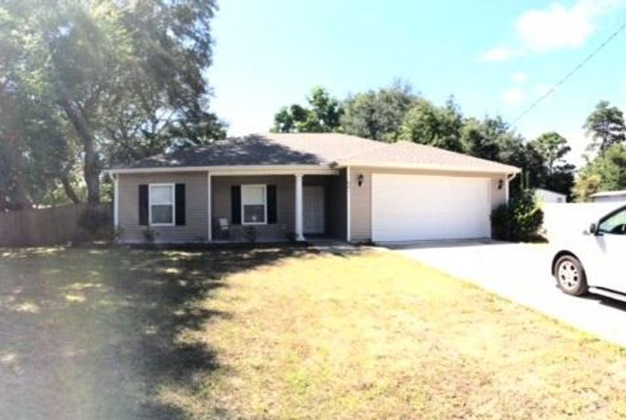 Well kept 4 bedroom Niceville home. Open living area has wood and tile flooring throughout. Split bedroom floor plan. Kitchen is complete with refrigerator, microwave, dishwasher and stove. Fenced yard. Washer & Dryer are included ''as is'' and will not be repaired or replaced by the owner. No pets. No smoking.