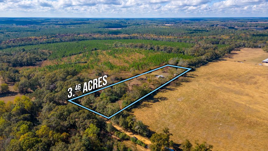 Located in the North end of Walton County, this 3.46 acres is a great buy! Located on a paved road with 200 feet of paved road frontage and surrounded by large tracts of land, this is the piece you have been looking for! Property offers large trees, great homesite and a covered storage barn. Old homesite is given zero value.