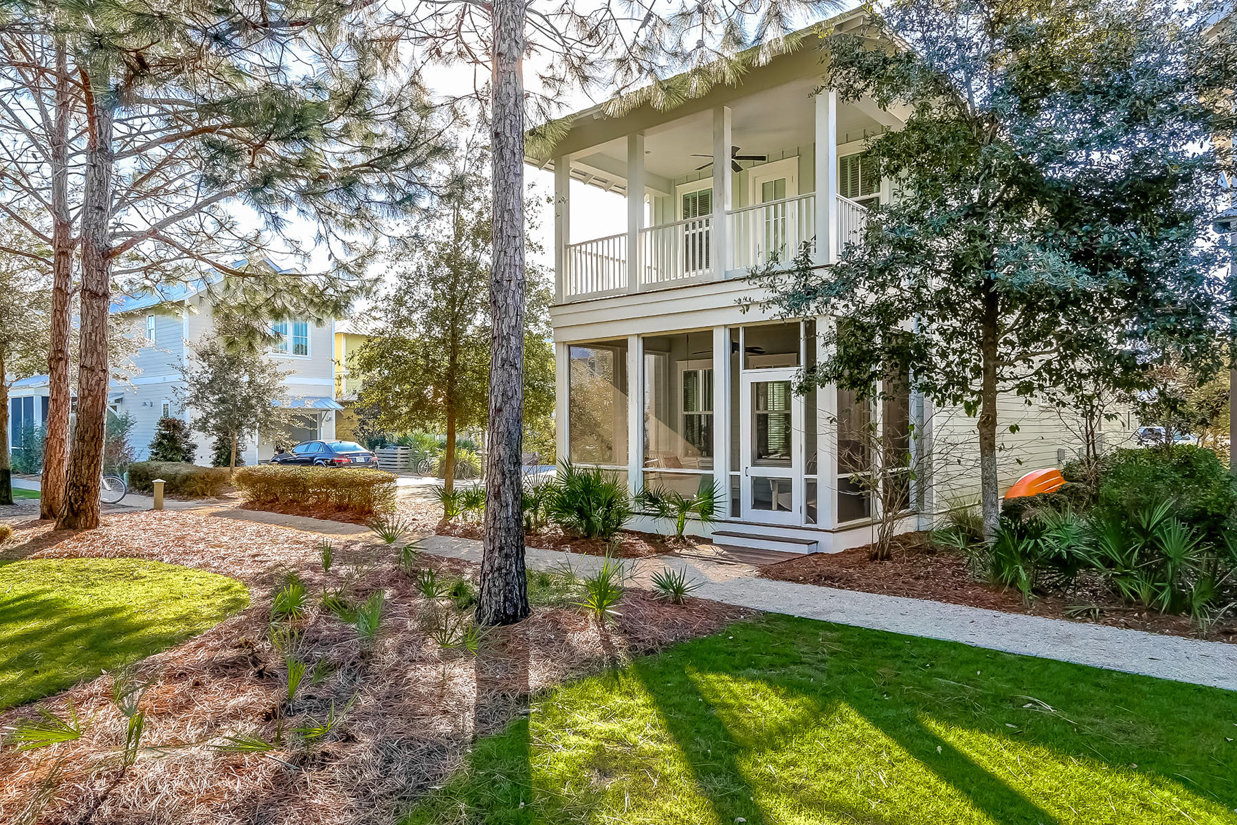 Nestled along Dragonfly Park on a corner in Watercolor's Crossings District, sits this quaint beach cottage, fully furnished with 4 bedrooms and an extra living space on the second floor. A walking path just off the front porch leads to the Dragonfly Pool, just a short stroll away. The well-appointed kitchen with s/s appliances and lovely granite counters overlooks the dining and living areas. The downstairs living area boasts a charming brick wood-burning fireplace and cozy screened front porch, and stained pine floors throughout with an office nook and large pantry.