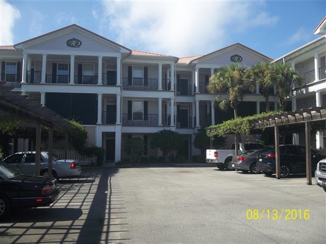 LOOKS BRAND NEW!! THIS IS A LOVELY WELL MAINTAINED GROUND FLOOR UNIT WITH COVERED PARKING RIGHT OUTSIDE THE FRONT DOOR. THE BEAUTIFULLY APPOINTED KITCHEN IS A JOY WITH GRANITE COUNTERTOPS, STAINLESS STEEL APPLIANCES AND A BREAKFAST BAR. PLAN TO TAKE TIME TO ENJOY OBSERVING NATURE ON THE SPACIOUS BALCONY. YOU CAN TAKE ADVANTAGE OF THE SEPARATE CLIMATE CONTROLLED PRIVATE SECURED STORAGE AND STAY IN SHAPE IN THE FITNESS CENTER. THIS LIFE STYLE OFFERS WALKING DISTANCE TO THE LANDING, MOVIES IN THAT PARK, GROCERY STORE, RESTAURANTS AND MANY OTHER AMENITIES. AND,IF YOU WISH, SMALL PETS 25 LBS AND UNDER CAN BE PART OF YOUR HOME. GUEST PARKING IS ALSO A PART OF THE PREMISES.