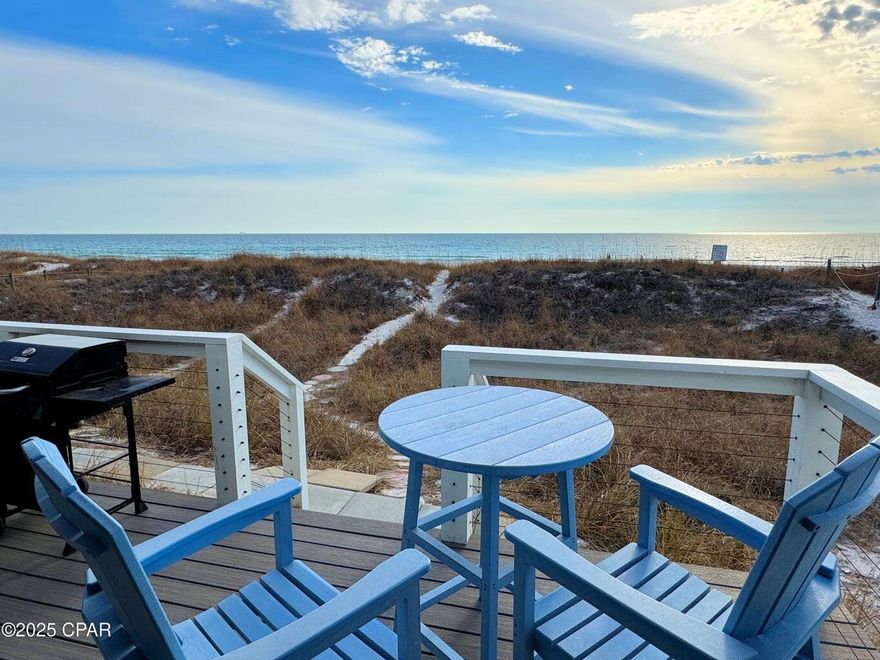 Imagine waking up to the sea every morning and going to bed with glorious sunsets every night! No HOA association rules or expense for this beachfront property with generous square footage, two Gulf-front decks, and a 1-car garage. The location is a surprisingly quiet area off the main drag, near many attractions, shops, and eateries. This rare 2-story townhome is offered fully furnished as a turn-key vacation rental or perfect second home. Note the easy-care flooring, beachy colors and decor, and thoughtful touches that create the relaxed atmosphere of a private family beach house. The expansive floor plan features living and entertainment space on the first floor with three bedrooms on the second, all having their own baths. The incredible beach view owner's suite has high ceilings, and streaming sunlight through high dormer windows, sitting area, and private deck. The spacious second bedroom has a queen bed plus two sets of full-sized bunk beds, so it really adds to the number of heads you can put in beds. And the dedicated bunk room has two twin sets for the kids. Both decks are brand new with durable poly furniture and breathtaking views of the stunning beach accented by the privacy and protection of the natural dunes. The ground floor deck has a convenient outdoor shower for those many sandy days. A paver pathway leads you to the sparkling waves of the Gulf of Mexico and days filled with joy. The full kitchen combines with the gas grill and wet bar for a wonderful evening full of fun and salty breezes. The bonus of a garage and long driveway is a big deal when parking is at a premium, and this set-up can accommodate RVs, trailers, and jet skis. Panama City Beach is buzzing with exciting new attractions set to make waves in 2025! Top Golf is bringing its high-tech, climate-controlled hitting bays to Pier Park, offering a fun and modern golf experience for all skill levels. Dolly Parton's Pirates Voyage Dinner & Show is setting sail with thrilling acrobatics, pyrotechnics, and a four-course feast, making it a must-see entertainment spot. Plus, the highly anticipated Wave Park promises exhilarating water adventures, adding even more fun to this vibrant coastal destination. Whether you're swinging a club, cheering on pirates, or riding the waves, PCB is gearing up for an unforgettable year! Reach out today for a Cost To Own Estimate to see how rental income can cover ownership costs and slip into the coastal lifestyle of your dreams! Request your private showing or on this rare opportunity to own an affordable beachfront property on the infamous emerald coast.