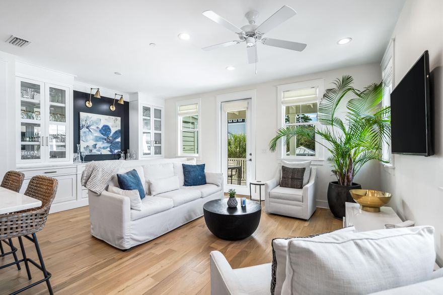 Discover the allure of beach living at 30A Townhomes nestled in the heart of Seagrove Beach on 30A. This spacious end-unit is in a prime location just steps from the community pool and features (3) bedrooms with bonus built-in bunk beds, (2.5) baths, and (1)-car garage that includes a 4-seater golf cart. Featuring dazzling upgrades, crisp and chic coastal decor, enhanced fixtures and furnishings, custom wet bar with built-in cabinets and shelves, marble kitchen counters with subway tile backsplash, and hardwood flooring. Great opportunity for a short-term vacation rental or primary residence as it's centrally located with 2 beach accesses less than 1/2 mile away, steps from Greenway Station's dining/shopping, state park trails, Eastern Lake, plus more. Claim your paradise on 30A today!