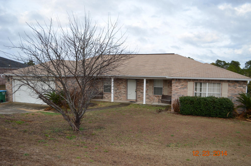 Convenient location in south Crestivew this large all brick home has 2 car garage, deck off the back door and privacy fenced back yard. Inside, there are 4 bedrooms with split bedroom design, vaulted ceilings, large open kitchen with island and breakfast area, and dining room. Floors are laminate, vinyl and carpet. Home needs some repairs and will not qualify for all financing due to repairs. Even so, this home is worth the visit. Lots of potential and room to work with. Call today and set up your showing.