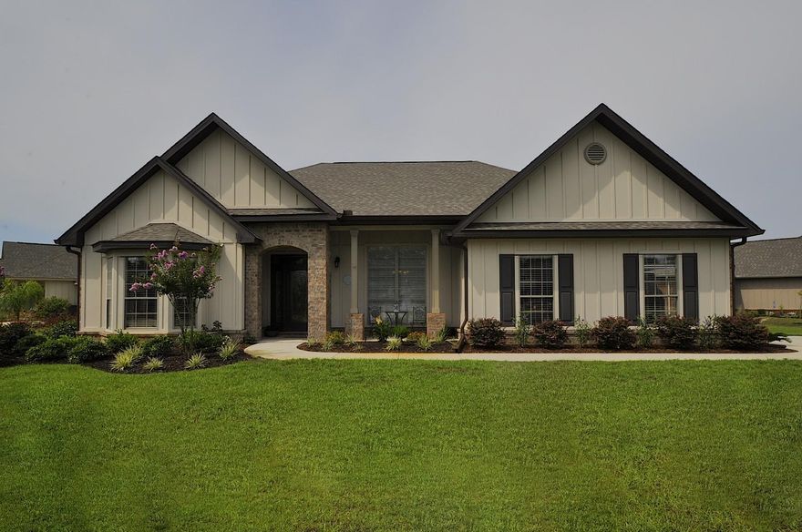 REDUCED AGAIN! - The desirable neighborhood of Whispering Lake is a beautiful new home community, centered around a tranquil, fresh water lake that is perfect for fishing. From the moment you walk in this well appointed home, you will be captivated by the elegant angles, arches and UPGRADES! PRICED WELL WITHIN NEIGHBORHOOD COMPARABLES! This lovely property is situated on a large corner lot and features 3 bedrooms, 2 baths, a formal living room or office with bay window, sunroom, a formal dining room with a soaring box tray ceiling, large and open kitchen with granite countertops and breakfast bar overlooking the arch encased breakfast nook, beautiful recessed panel maple cabinets with lighting above and below, staggered with crown molding and upgraded appliance