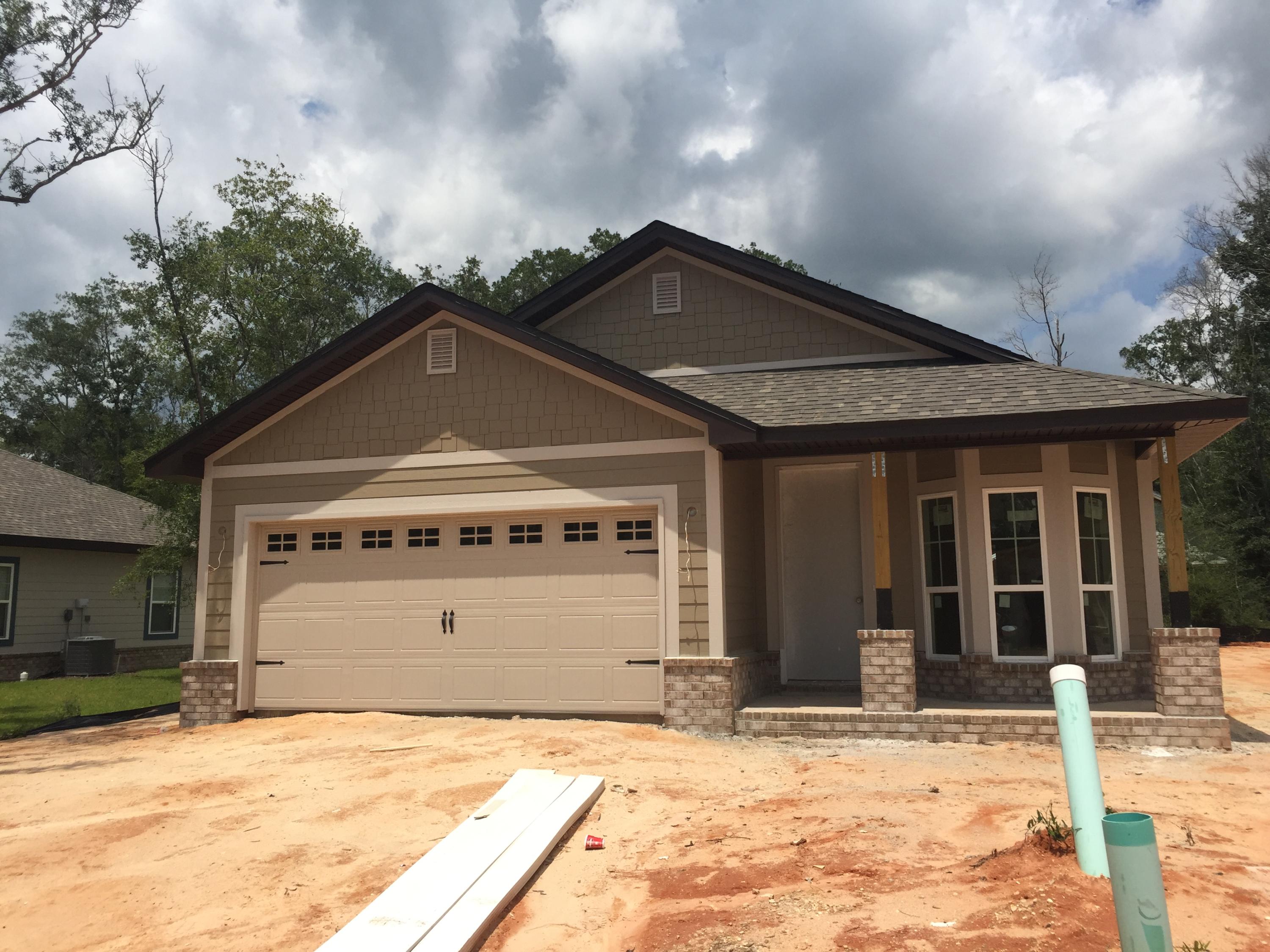 Now under construction in The Canopies, adorable 3/2 Craftsman style home. Great location in Freeport, near Publix and just 20 minutes to the Beach! This home to have 9' ceilings, including tray ceiling in master bedroom, 8' entry doors, covered back porch, beaded cabinets, granite, Polywood mini blinds and more. Community pool and playground for owners to enjoy! Only $360/year association fee! Seller pays closing costs except prepaids with approved lender and new buyer fee!