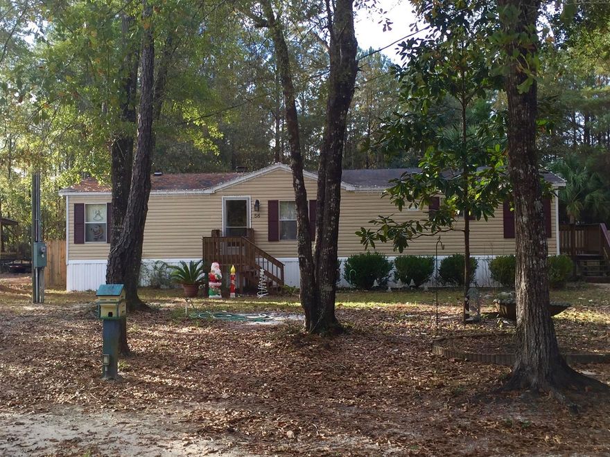 Back on the market, this home has 3 bedrooms and 2 bath. New carpet was installed in 20014 in the bedrooms and living room. Master bedroom will have new carpet installed. As you enter the into the front door, large living room with gas fireplace. The kitchen has plenty of cabinets and a work station. Separate area for the dining table with an access to the outside. Master bathroom has a large garden tub, separate shower and double vanity. There is an exit door off the laundry room that goes into a large screened in porch with three new doors. Two of the doors access to the fenced in backyard. Updated walkway to the 27' x 4 1/2 above ground pool. Home is sold ''AS IS''