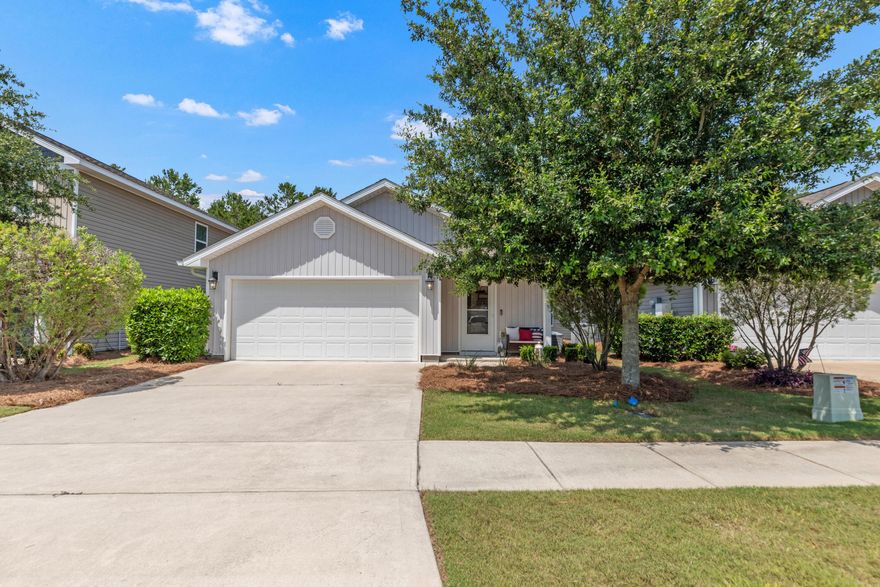 Charming 3/2 single story home with 2 car garage in Crescent Mill at Hammock Bay! This home has it all: beautiful front yard shade tree, covered front porch, front storm door, large foyer with coat closet, crown molding, LVP floors throughout, open floor plan with welcoming kitchen, primary bedroom/bath at rear of home, laundry room with upper cabinets, gutters, huge backyard paver patio, and even lawn care covered by the HOA. HOA fee also includes access to all amenities including the 8,000 SF fitness center, three swimming pools, three clubhouses, walking trails, 60 acre sports park, 500' pier, and all resident activities in The Windmills such as farmers markets and concerts! Sellers offering two months HOA fees, washer/dryer and  refrigerator. Buyers to verify all dimensions and info. Buyer to verify all dimensions and information important to them.